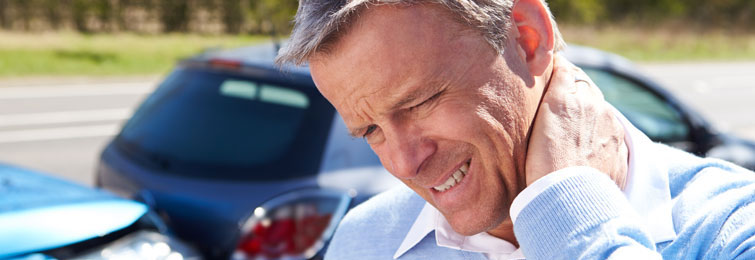 Man holding his neck after an auto accident